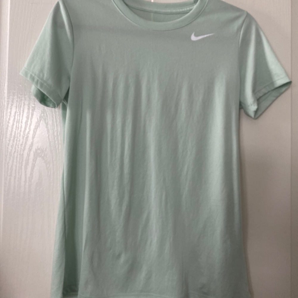 The Nike Tee woman’s size S Dri-Fit teal